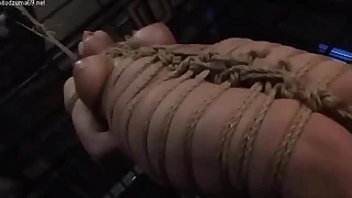 Filthy asian whore surrounding shibari gets spanked